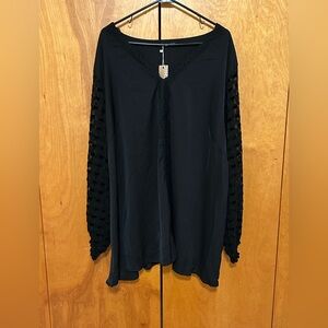 BloomChic Black V‑Neck Tunic with Sheer Grid Sleeves Cutout Neckline